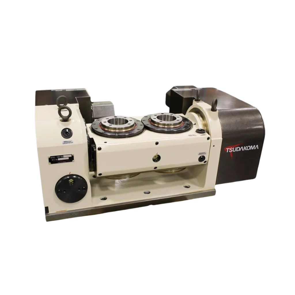 Mesa rotatoria CNC marca Tsudakoma con doble plato para integración de cuarto y quinto eje en centros de maquinado de alta precisión.