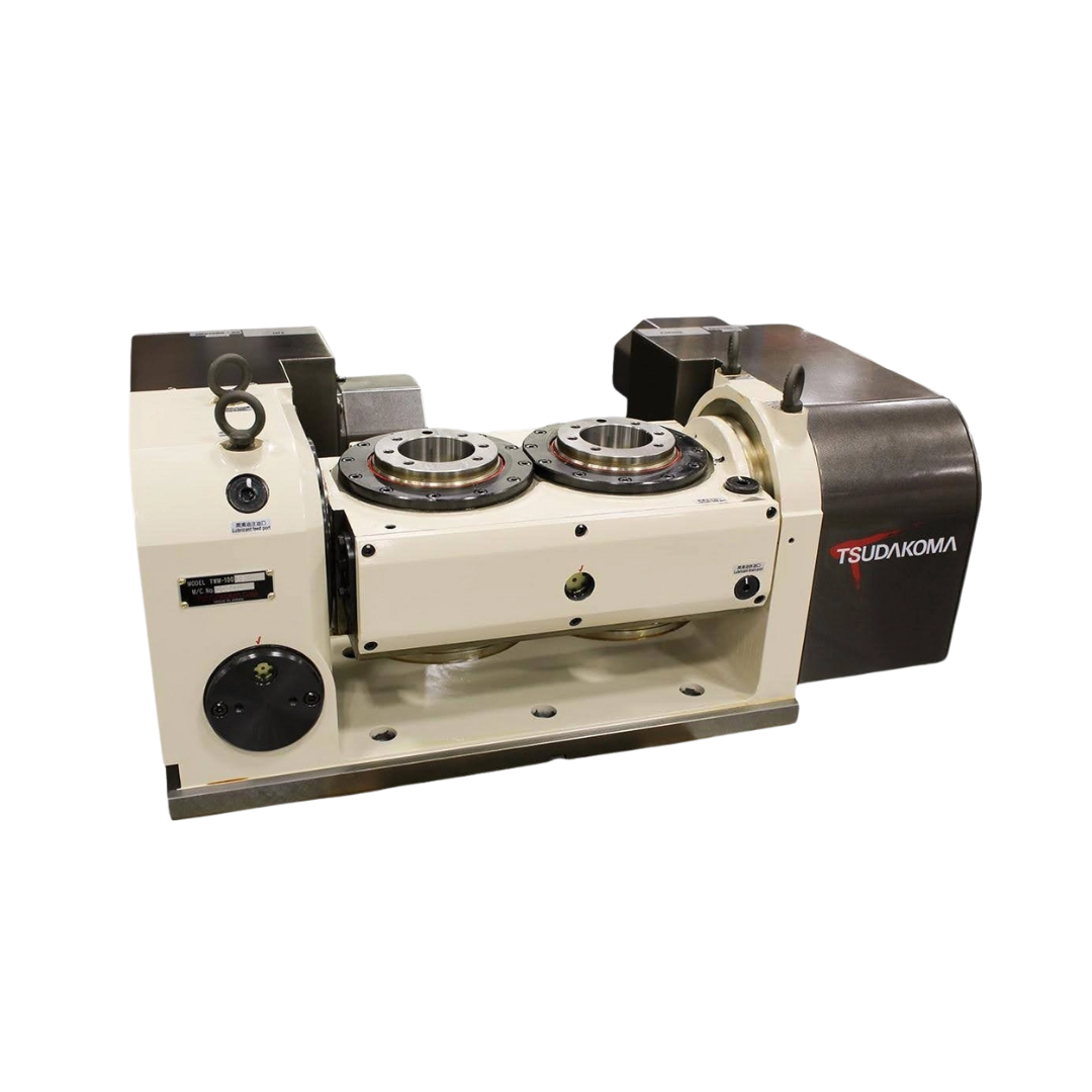 Mesa rotatoria CNC marca Tsudakoma con doble plato para integración de cuarto y quinto eje en centros de maquinado de alta precisión.